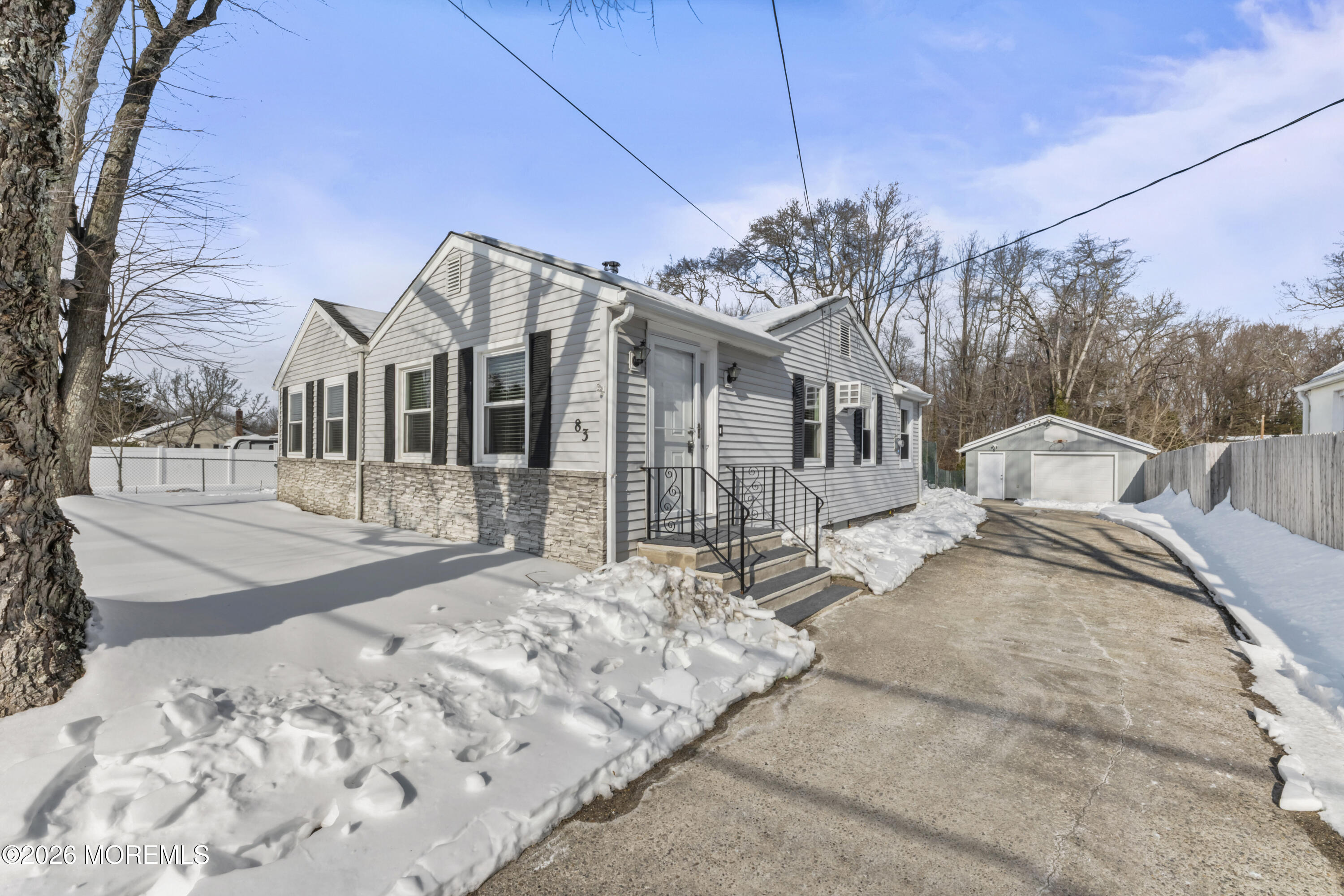 83 Chesterfield Jacobstown Road Wrightstown, NJ 08562 - Photo 4 of 52 a view of a house with snow on the road