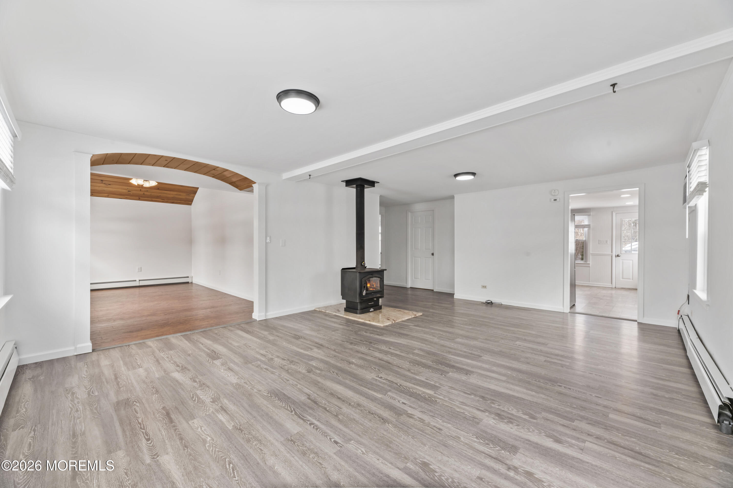83 Chesterfield Jacobstown Road Wrightstown, NJ 08562 - Photo 6 of 52 a view of a room with wooden floor and a window