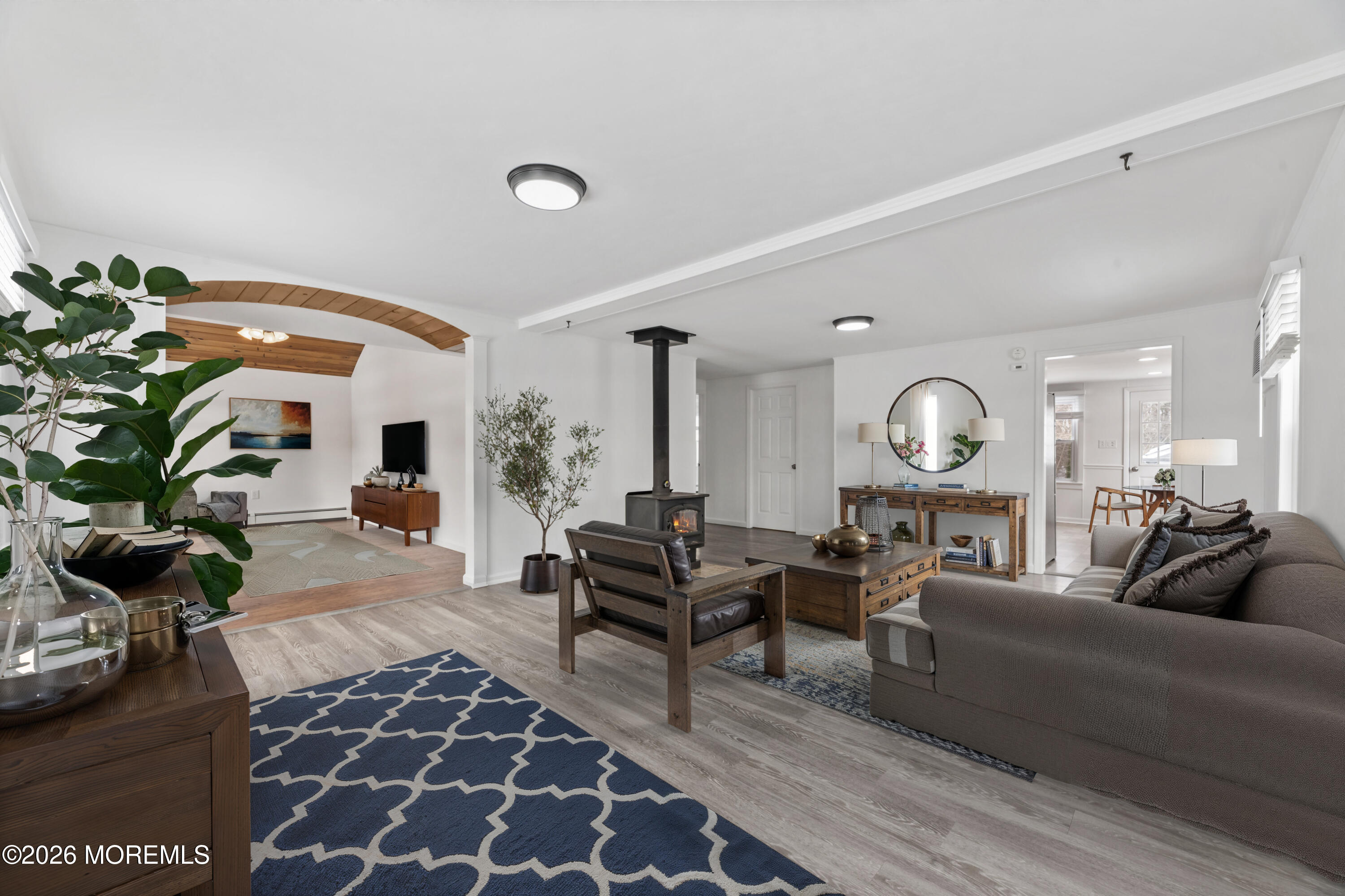 83 Chesterfield Jacobstown Road Wrightstown, NJ 08562 - Photo 7 of 52 a living room with furniture potted plant and a large window