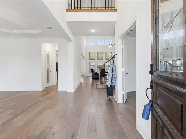 a view of a livingroom with wooden floor