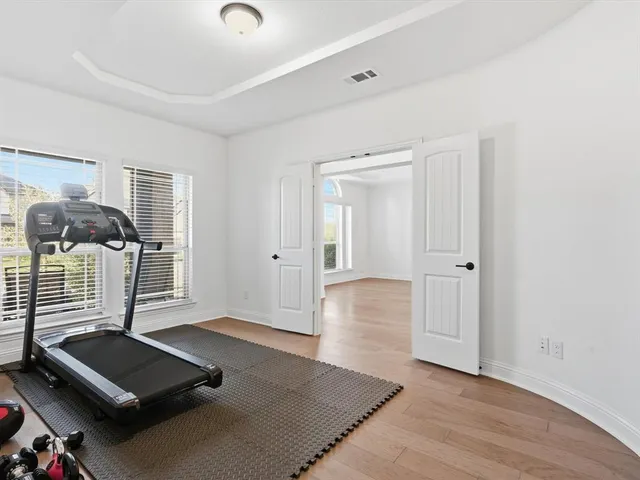 a view of a room with gym equipment