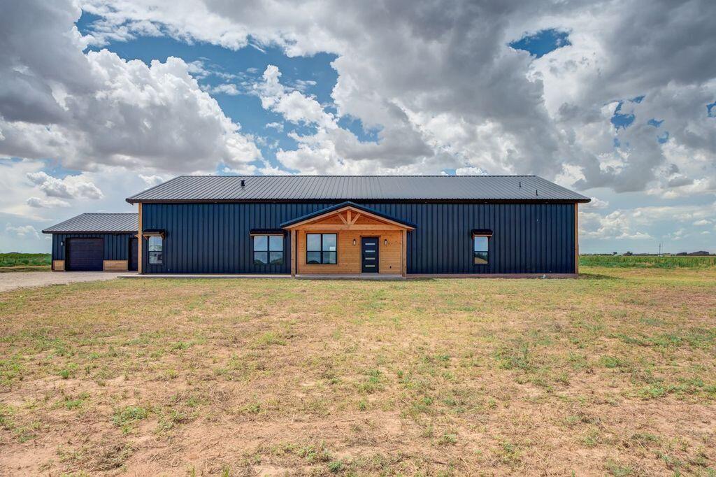 6601 North C R 1500 Shallowater, TX 79363 - Photo 2 of 39 a house view with a outdoor space