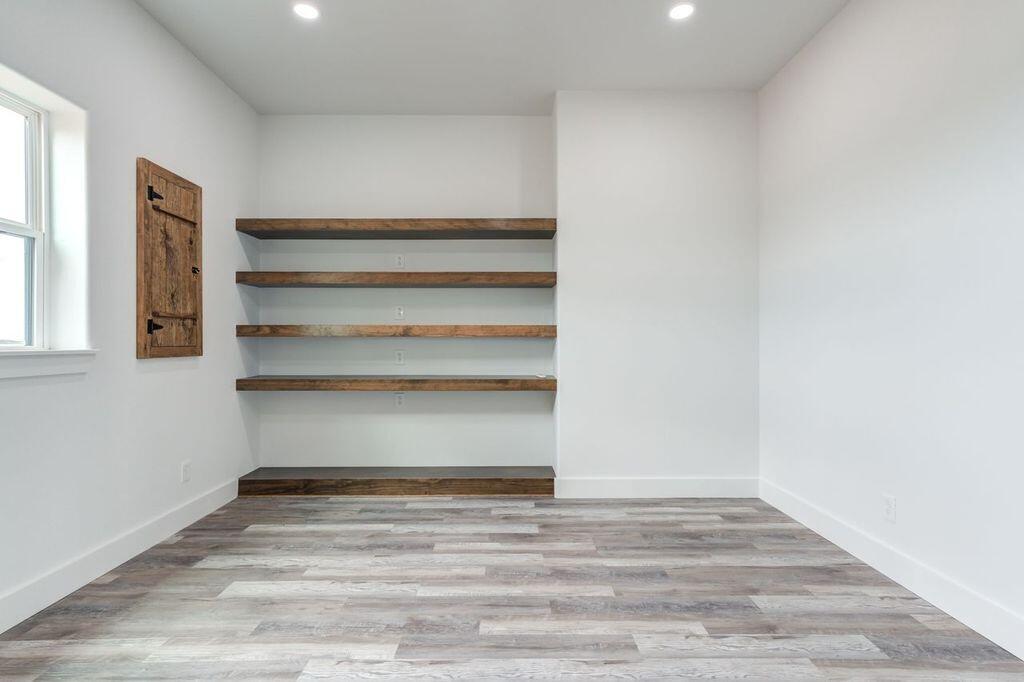 6601 North C R 1500 Shallowater, TX 79363 - Photo 26 of 39 a view of room and empty room