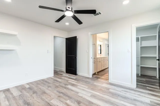 a bathroom with a bathtub and a sink