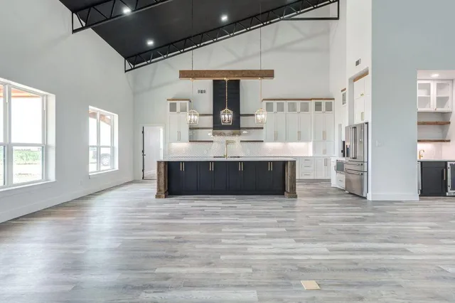 a view of living room with furniture and window