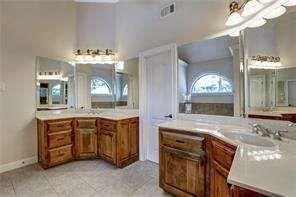802 Pathview Court Dacula, GA 30019 - Photo 47 of 56 a view of a double vanity sink and a mirror