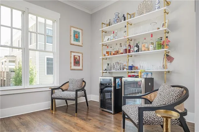 a room with a workspace and a window