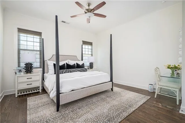 a room with a bed and a cabinets