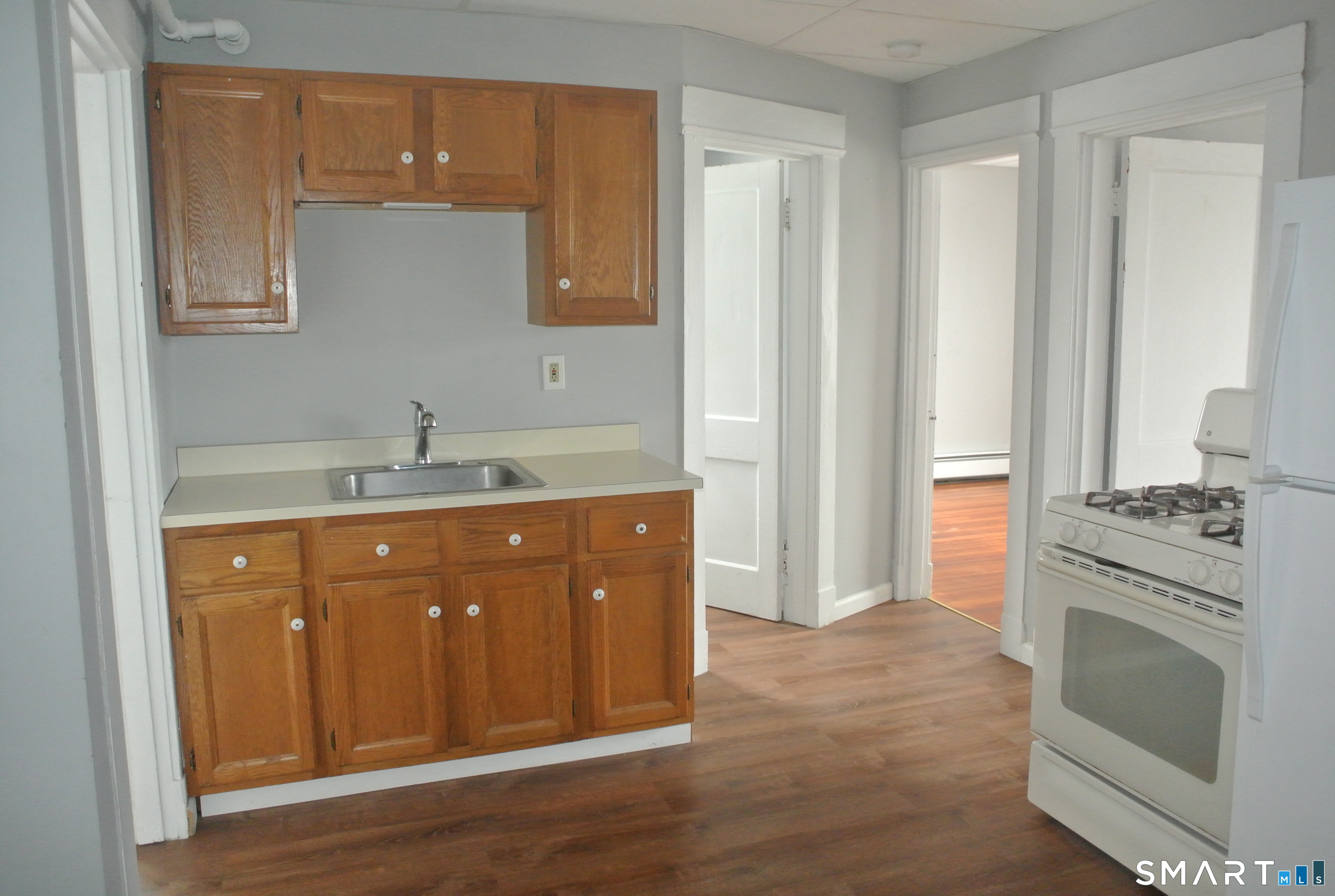 549 Howe Avenue, Unit A31 Shelton, CT 06484 - Photo 1 of 1 a spacious bathroom with a granite countertop sink and a mirror