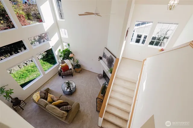 a view of living room with furniture and a window