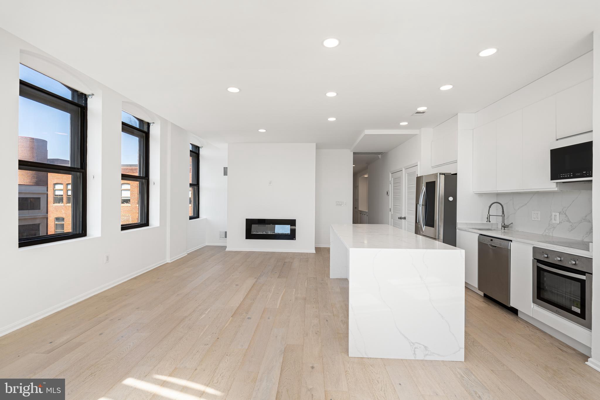 3299 K Street Northwest, Unit 704 Washington, DC 20007 - Photo 17 of 34 Kitchen and living room