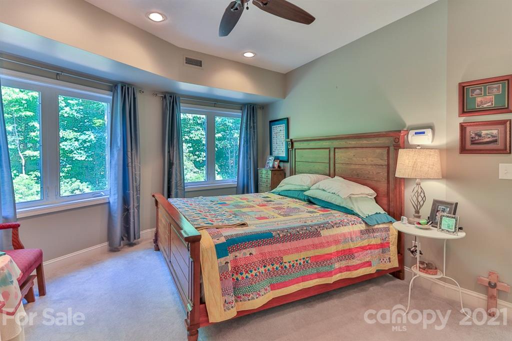 24 Juniper Lane Marion, NC 28752 - Photo 15 of 48 a bedroom with a bed and a window