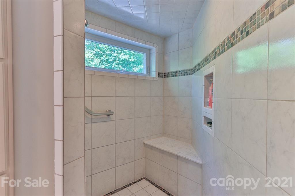 24 Juniper Lane Marion, NC 28752 - Photo 18 of 48 a bathroom with a shower