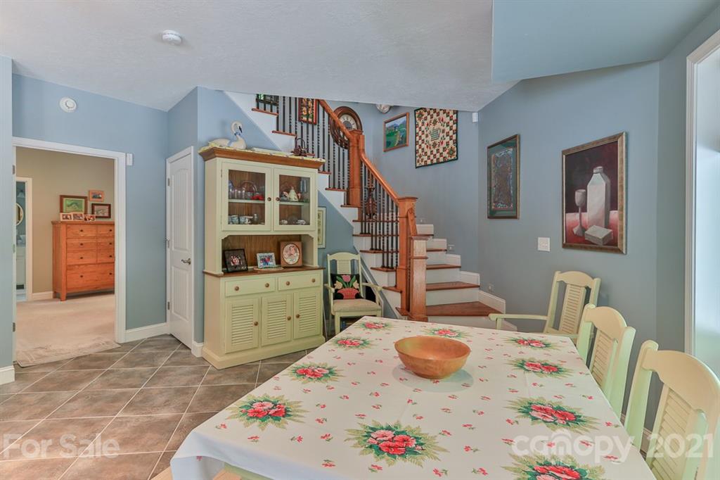 24 Juniper Lane Marion, NC 28752 - Photo 21 of 48 a bedroom with a bed and a table in it