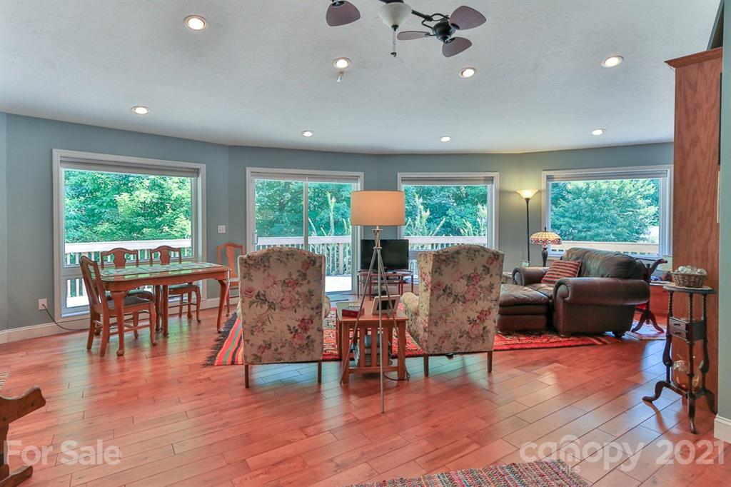 24 Juniper Lane Marion, NC 28752 - Photo 22 of 48 a living room with furniture and a wooden floor