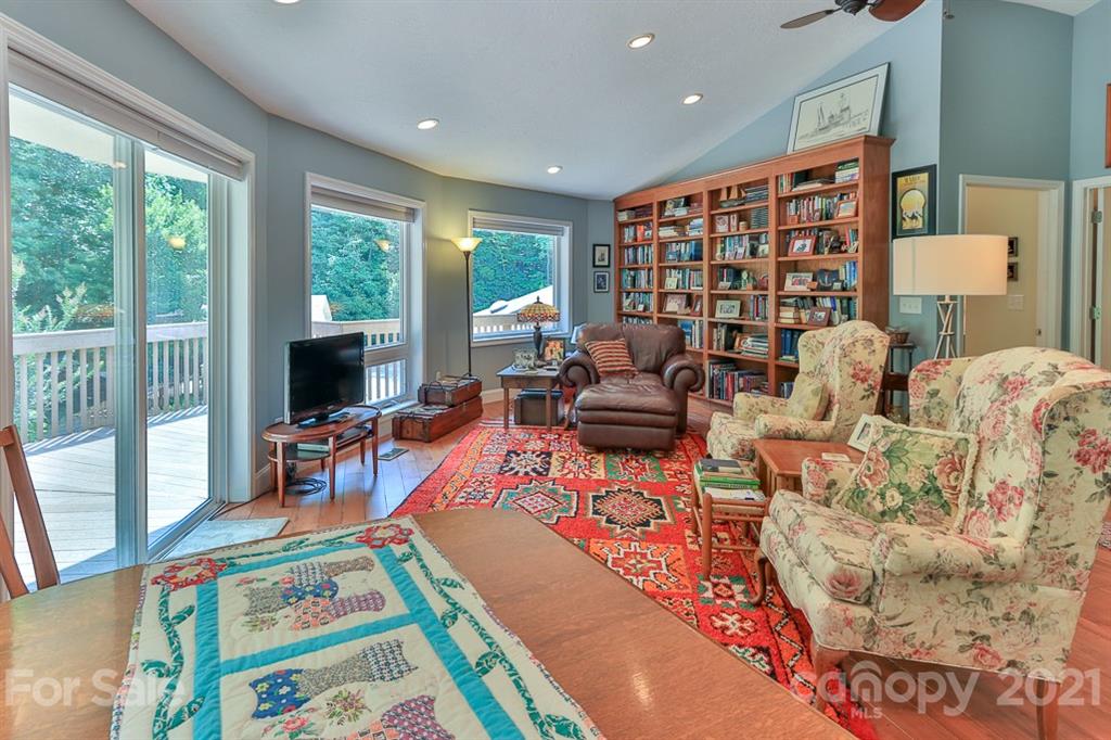 24 Juniper Lane Marion, NC 28752 - Photo 23 of 48 a living room filled with furniture and a flat screen tv