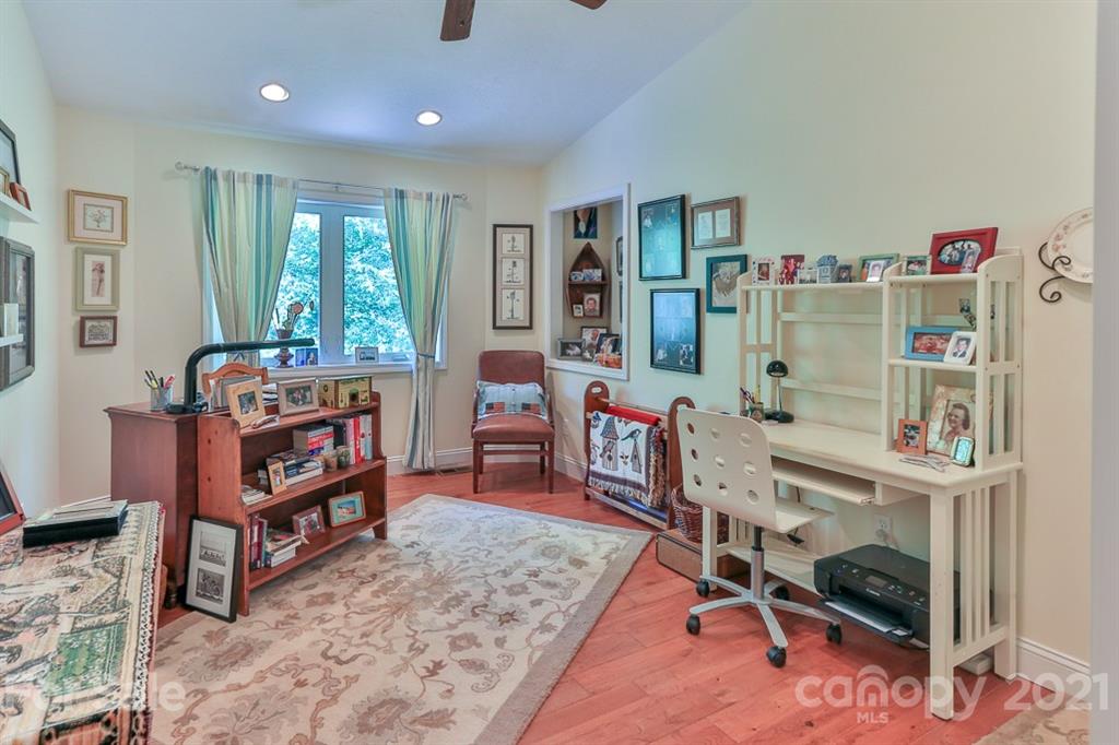 24 Juniper Lane Marion, NC 28752 - Photo 26 of 48 a bedroom with furniture and a wooden floor