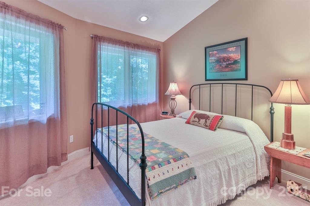 24 Juniper Lane Marion, NC 28752 - Photo 27 of 48 a bed room with a bed and a painting