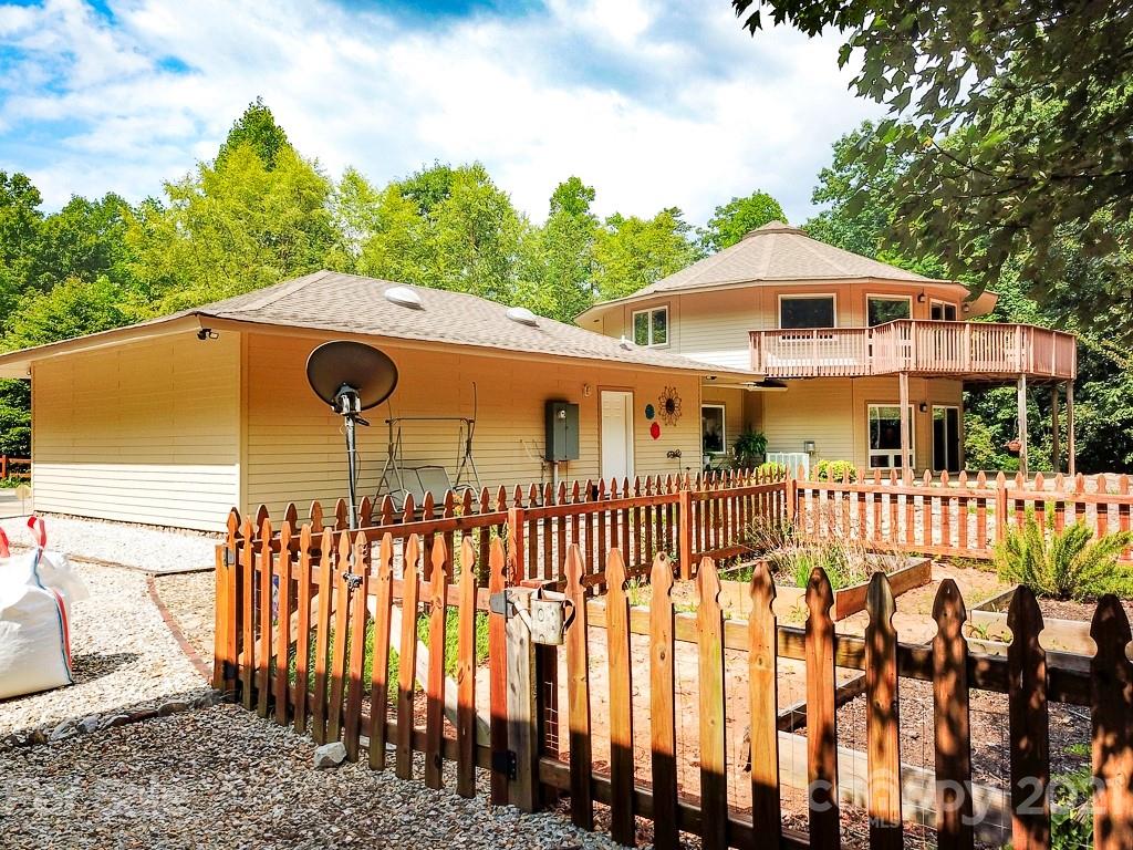 24 Juniper Lane Marion, NC 28752 - Photo 33 of 48 a front view of a house with a yard