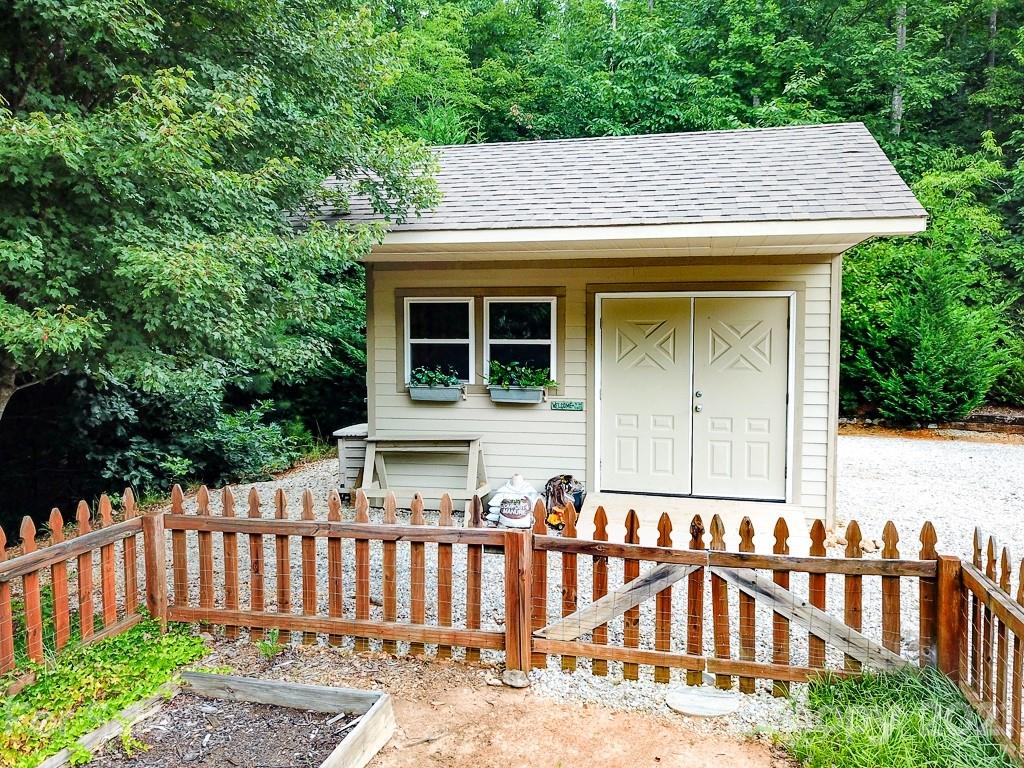 24 Juniper Lane Marion, NC 28752 - Photo 37 of 48 a view of a house with a yard