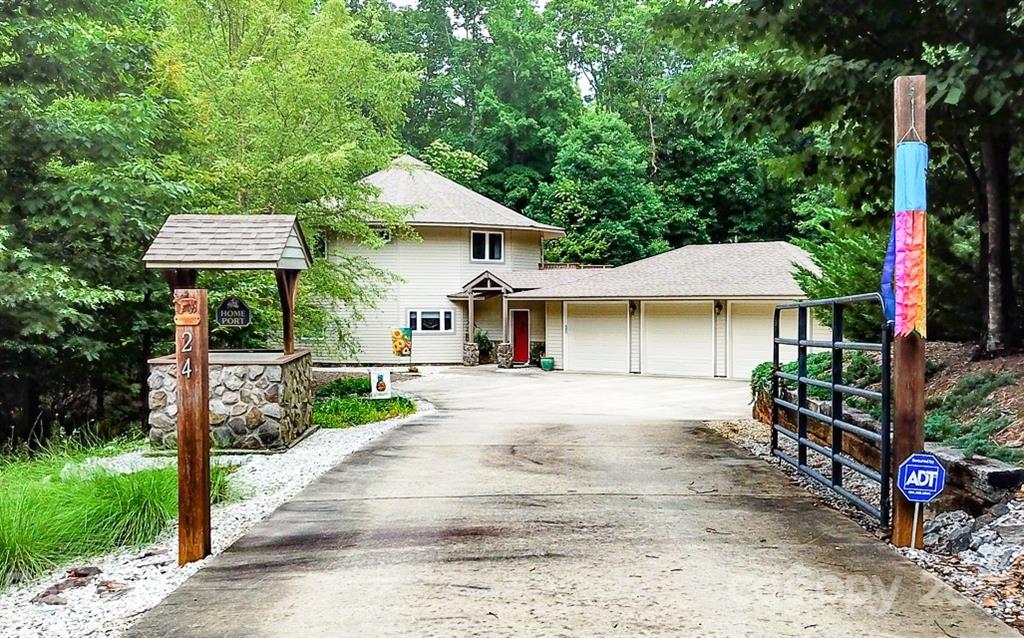 24 Juniper Lane Marion, NC 28752 - Photo 41 of 48 a view of a house with backyard and garden