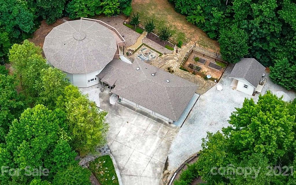 24 Juniper Lane Marion, NC 28752 - Photo 43 of 48 an aerial view of a house with outdoor space and trees all around