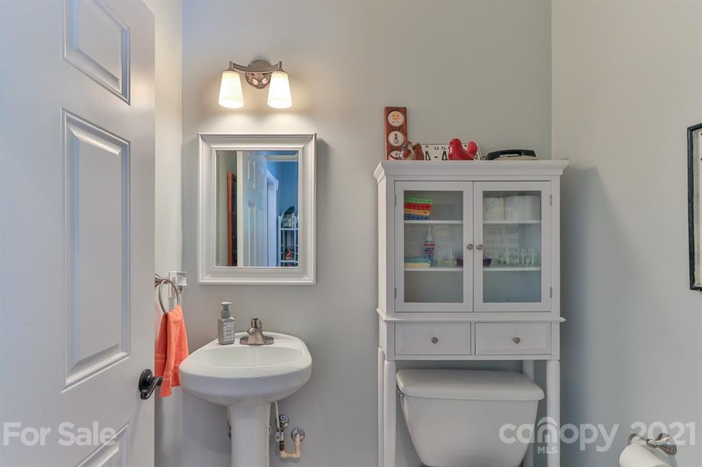 24 Juniper Lane Marion, NC 28752 - Photo 9 of 48 a bathroom with a sink and a mirror
