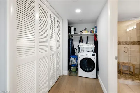 a view of a kitchen with washer and dryer