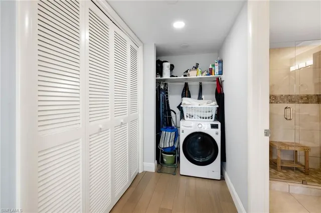 a view of a kitchen with washer and dryer
