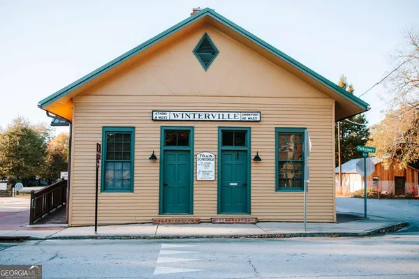 a street sign on a pole on a street