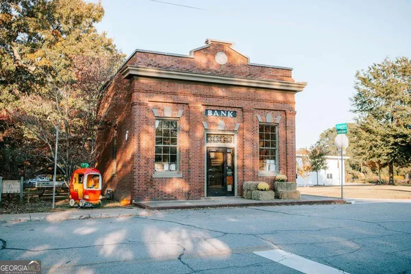 a view of a yard with trees