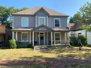 617 West Gandy Street Denison, TX 75020 - Photo 1 of 14 a front view of a house with a yard
