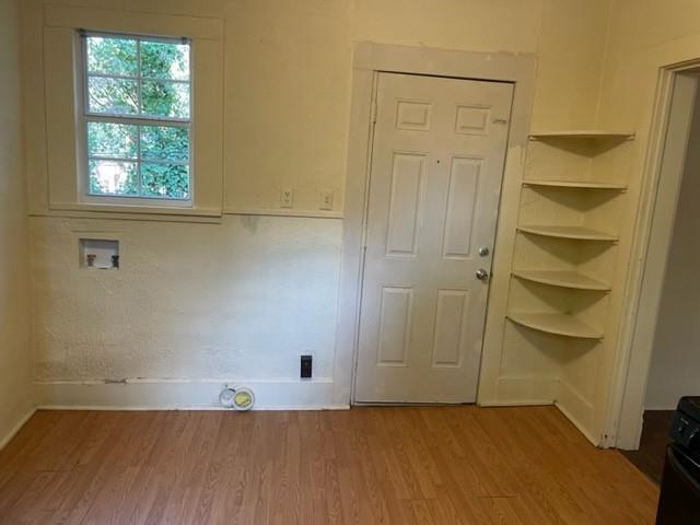 617 West Gandy Street Denison, TX 75020 - Photo 4 of 14 a view of an empty room with a closet