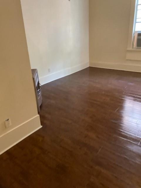 617 West Gandy Street Denison, TX 75020 - Photo 10 of 14 an empty room with windows