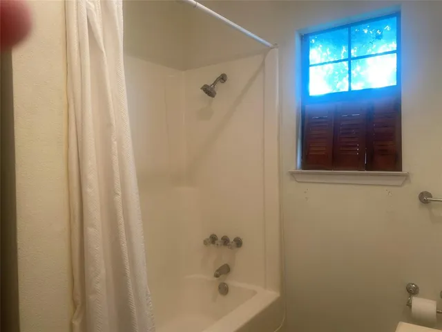 a bathroom with a bathtub