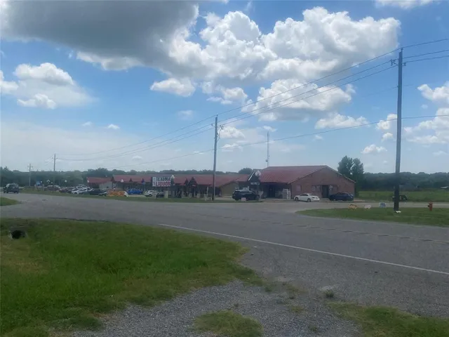 a view of a golf course with a lake