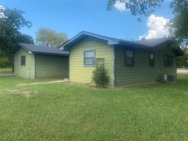 a house view with a garden space