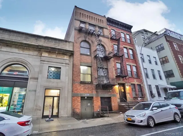 a view of a car park in front of a building