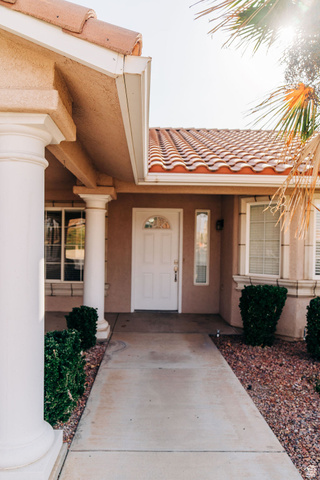 1825 West Mathis Park Place, Unit 40 St. George, UT 84770 - Photo 5 of 28 Entrance to property featuring a tiled roof and stucco siding