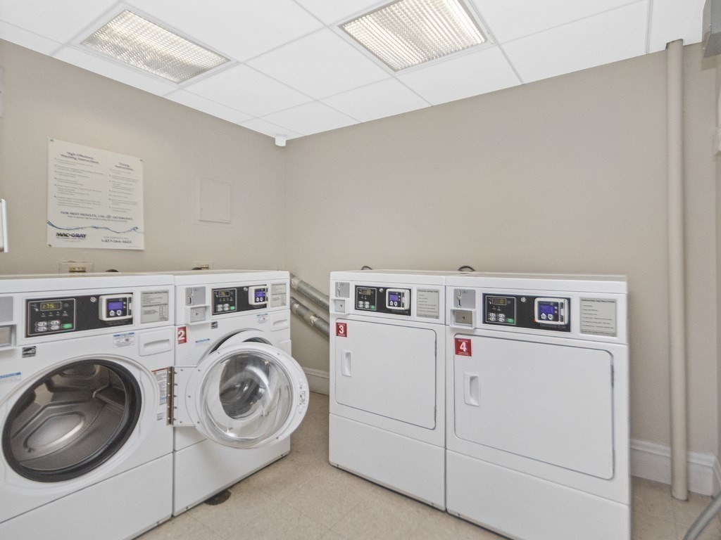 21 Beacon Street, Unit 5I Boston, MA 02108 - Photo 11 of 13 a utility room with dryer and washer