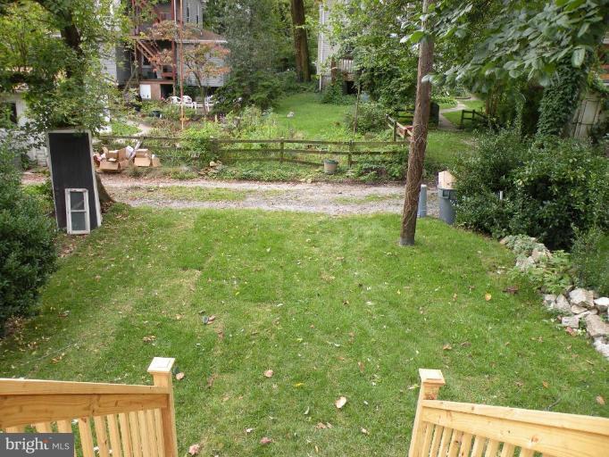 629 Deepdene Road Baltimore, MD 21210 - Photo 2 of 13 a view of a street with a tree