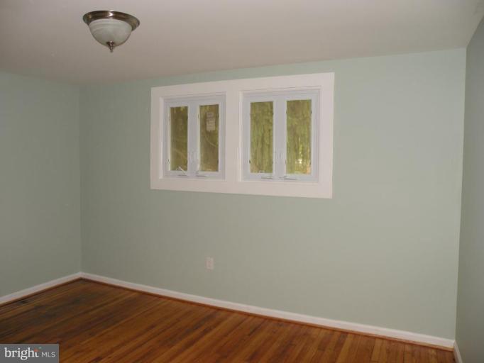 629 Deepdene Road Baltimore, MD 21210 - Photo 3 of 13 an empty room with a window