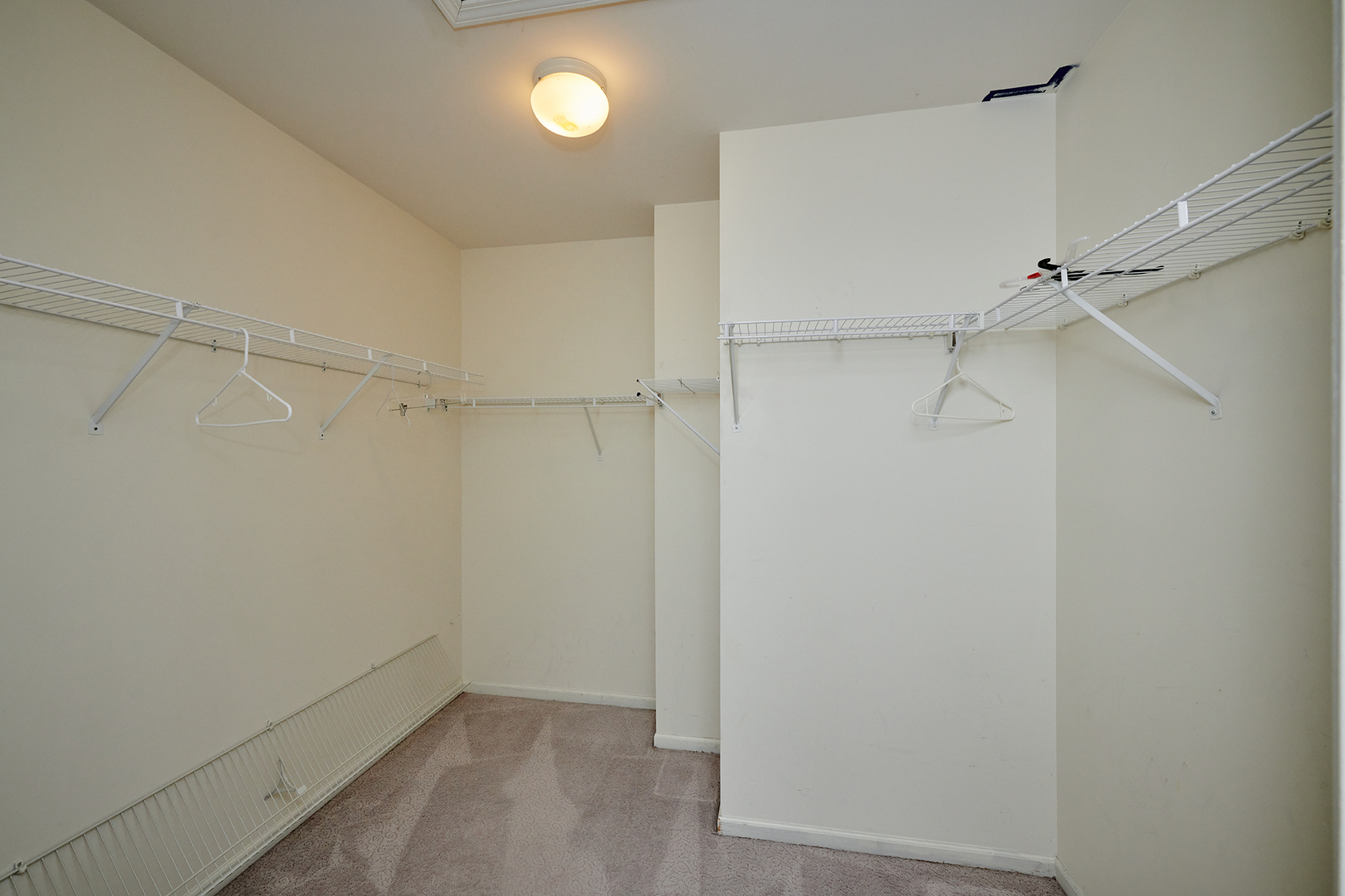 540 Wynbrooke Road Romeoville, IL 60446 - Photo 15 of 27 a view of an empty walk in closet