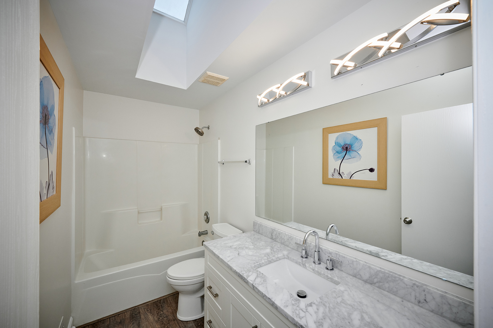540 Wynbrooke Road Romeoville, IL 60446 - Photo 19 of 27 a bathroom with a granite countertop toilet a sink and a mirror