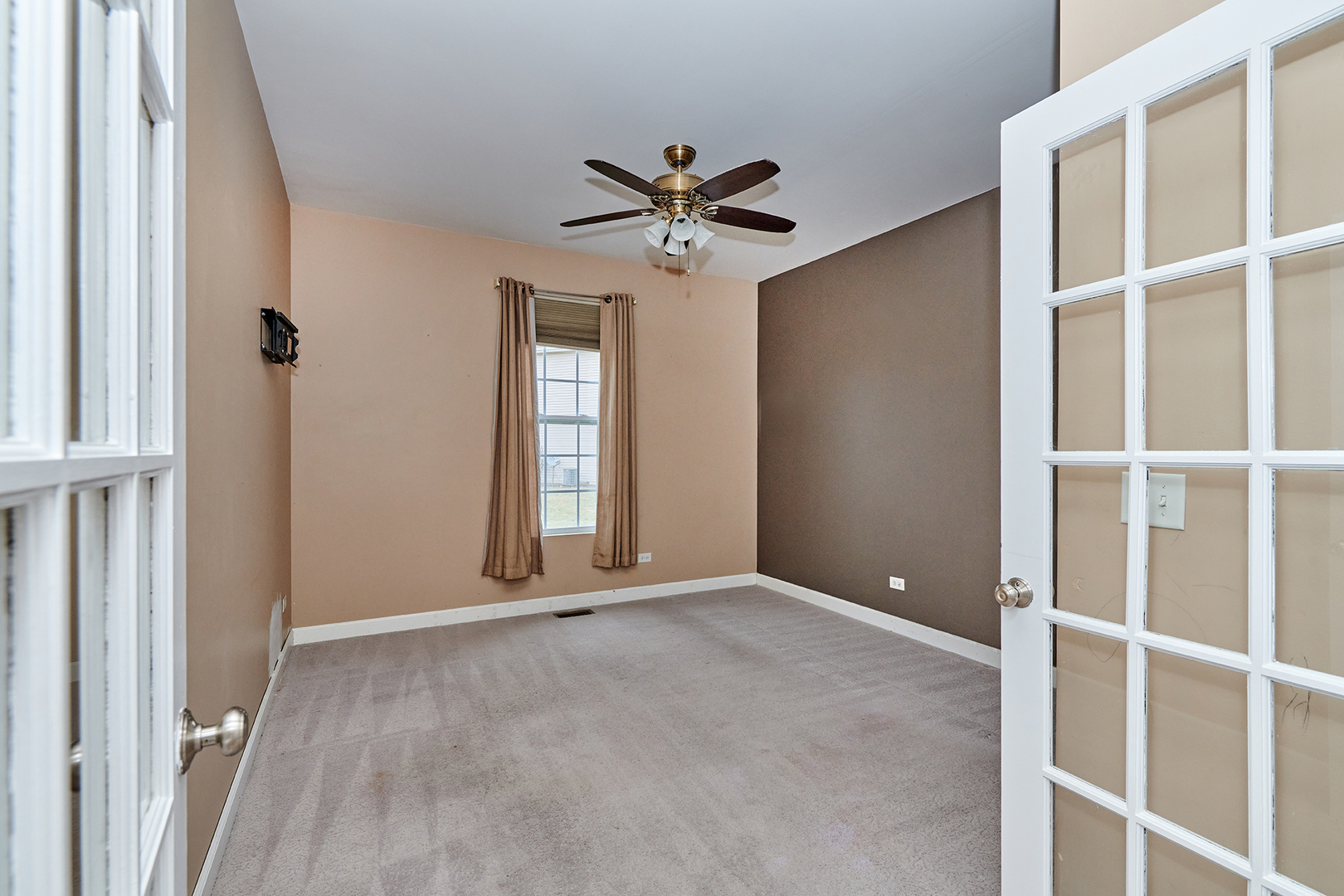 540 Wynbrooke Road Romeoville, IL 60446 - Photo 22 of 27 a view of an empty room with a window