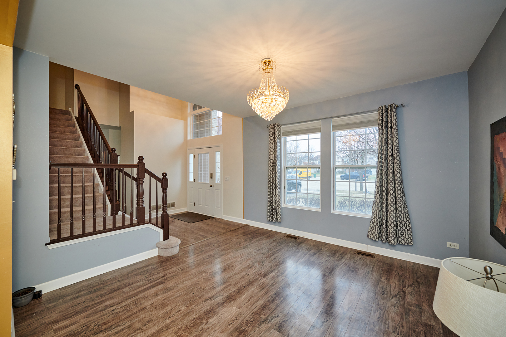 540 Wynbrooke Road Romeoville, IL 60446 - Photo 3 of 27 wooden floor in an empty room with a window
