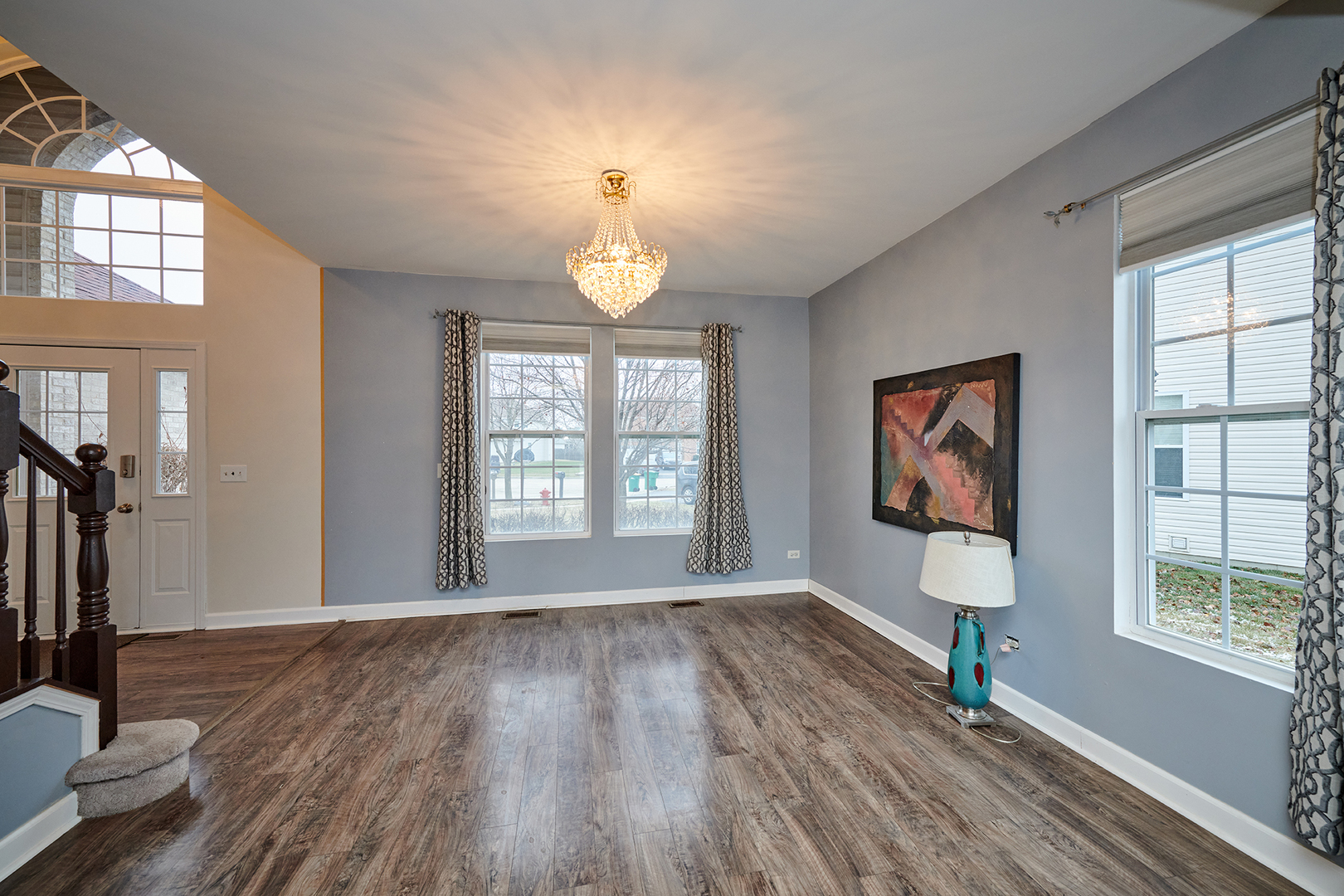 540 Wynbrooke Road Romeoville, IL 60446 - Photo 4 of 27 a view of an empty room with window and wooden floor