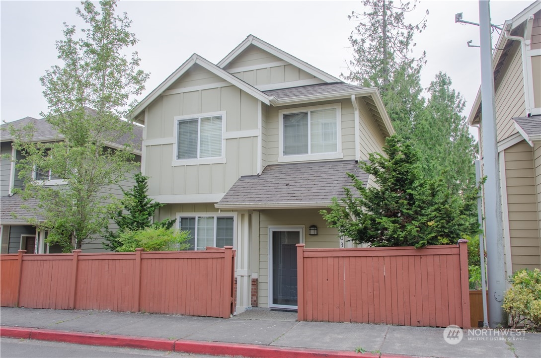 a view of house with outdoor space and yard