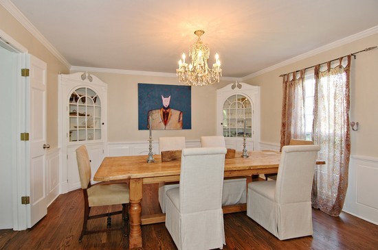 69 Round Barn Road Barrington Hills, IL 60010 - Photo 4 of 15 a view of a dining room with furniture window and wooden floor