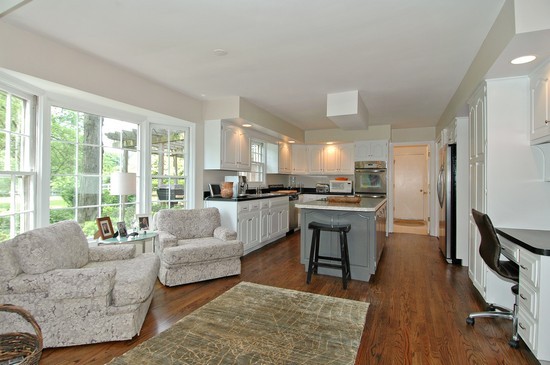 69 Round Barn Road Barrington Hills, IL 60010 - Photo 6 of 15 a living room with furniture and a wooden floor